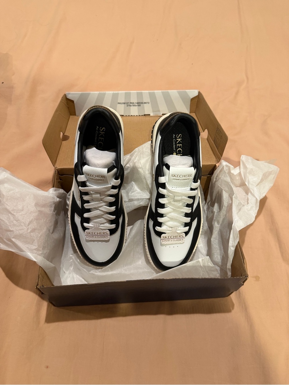 Skechers Women’s Black and White athletic sneakers. Never been worn. In box